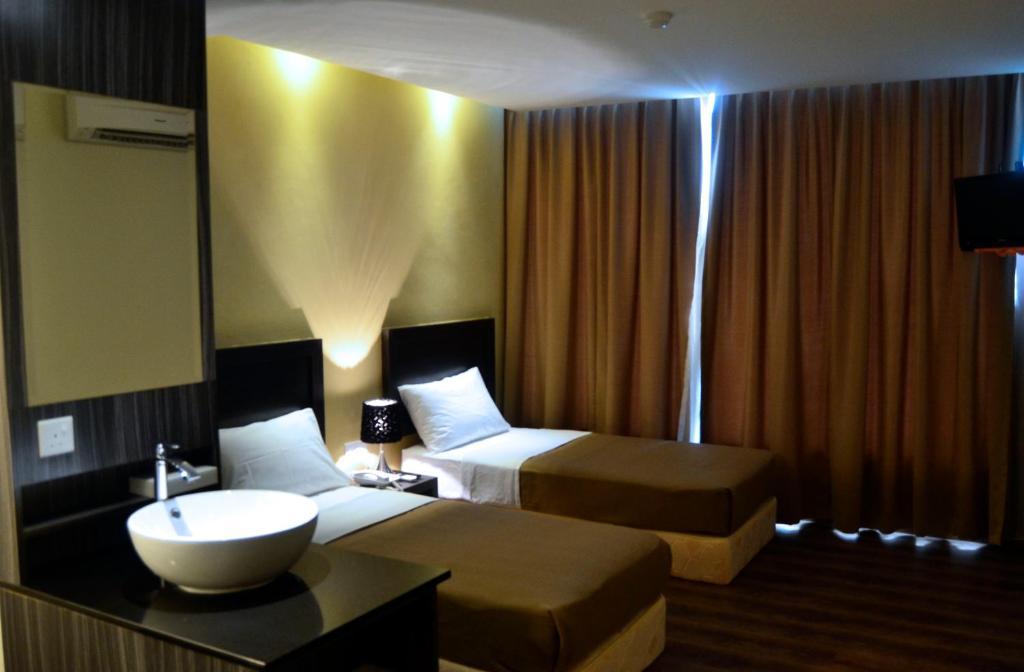Zotel Business & Leisure Hotel Кучинг Номер фото
